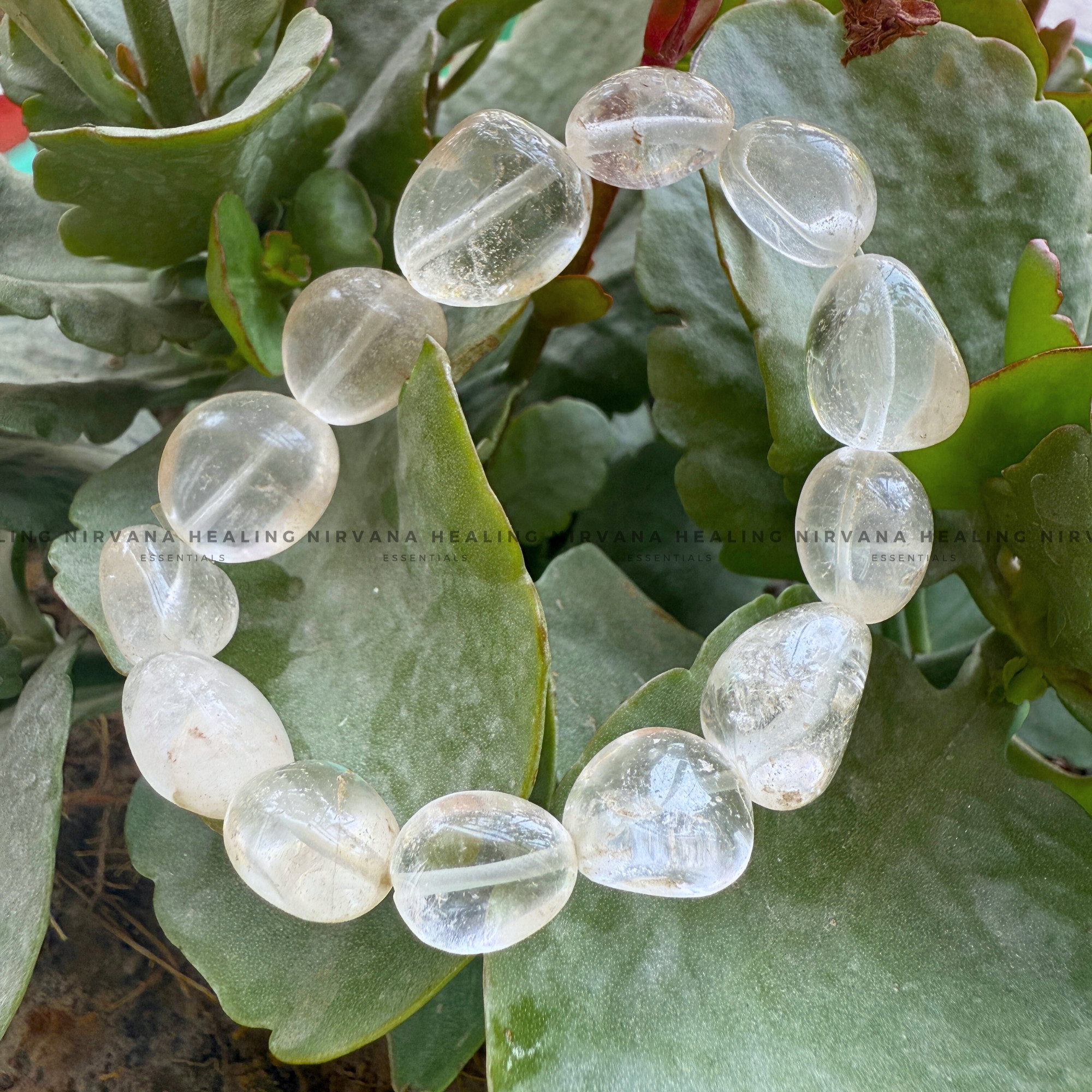 CLEAR QUARTZ TUMBLE OVAL BEADED BRACELET (Mental Clarity, Master Healer And Energy Amplifier).
- Image 4