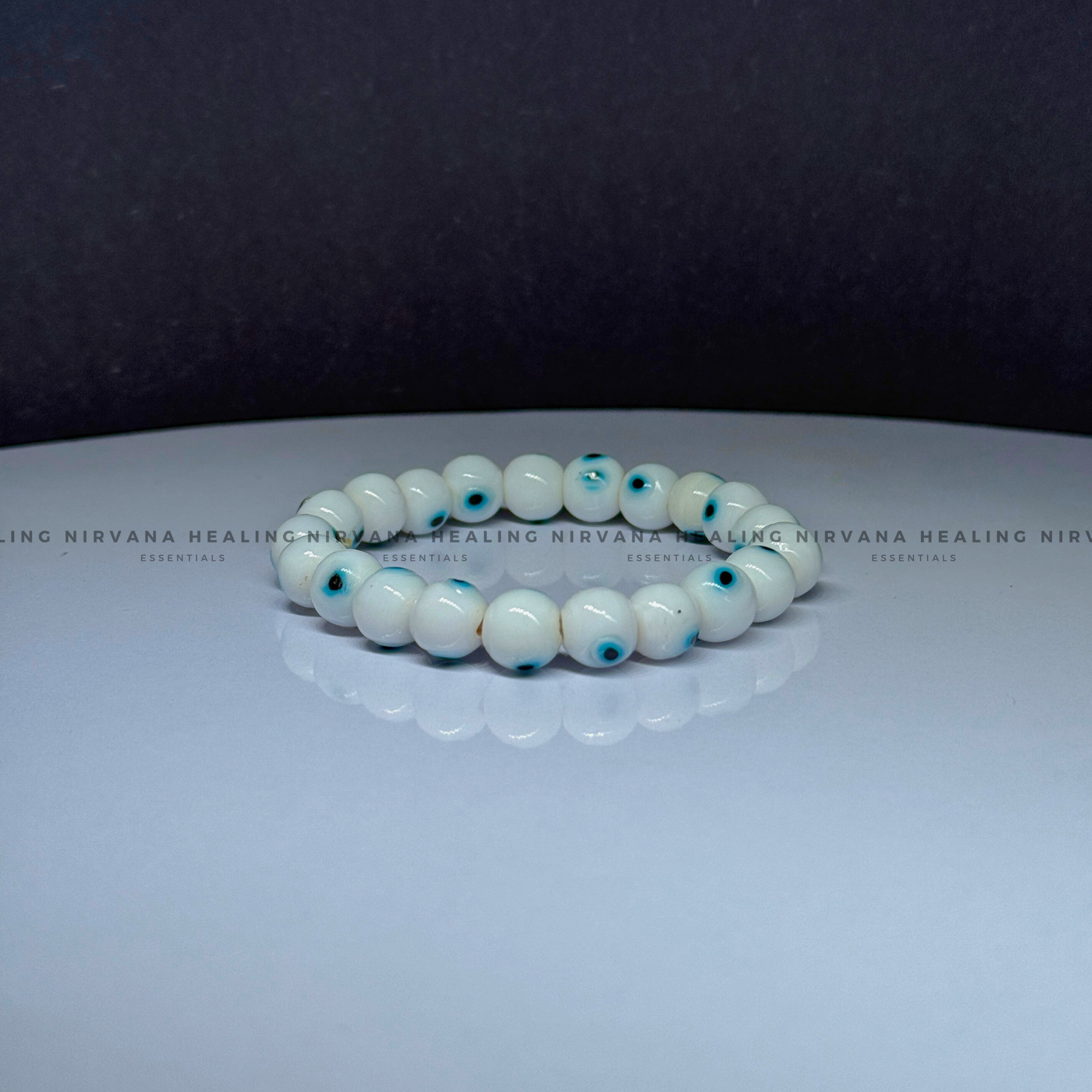 WHITE EVIL EYE ROUND BEADED BRACELET (Purity, Protection And New Beginnings) - Image 4