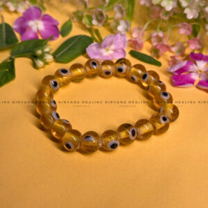 YELLOW CRYSTAL EVIL EYE ROUND BEADED BRACELET (Optimism, Clarity, Protection)